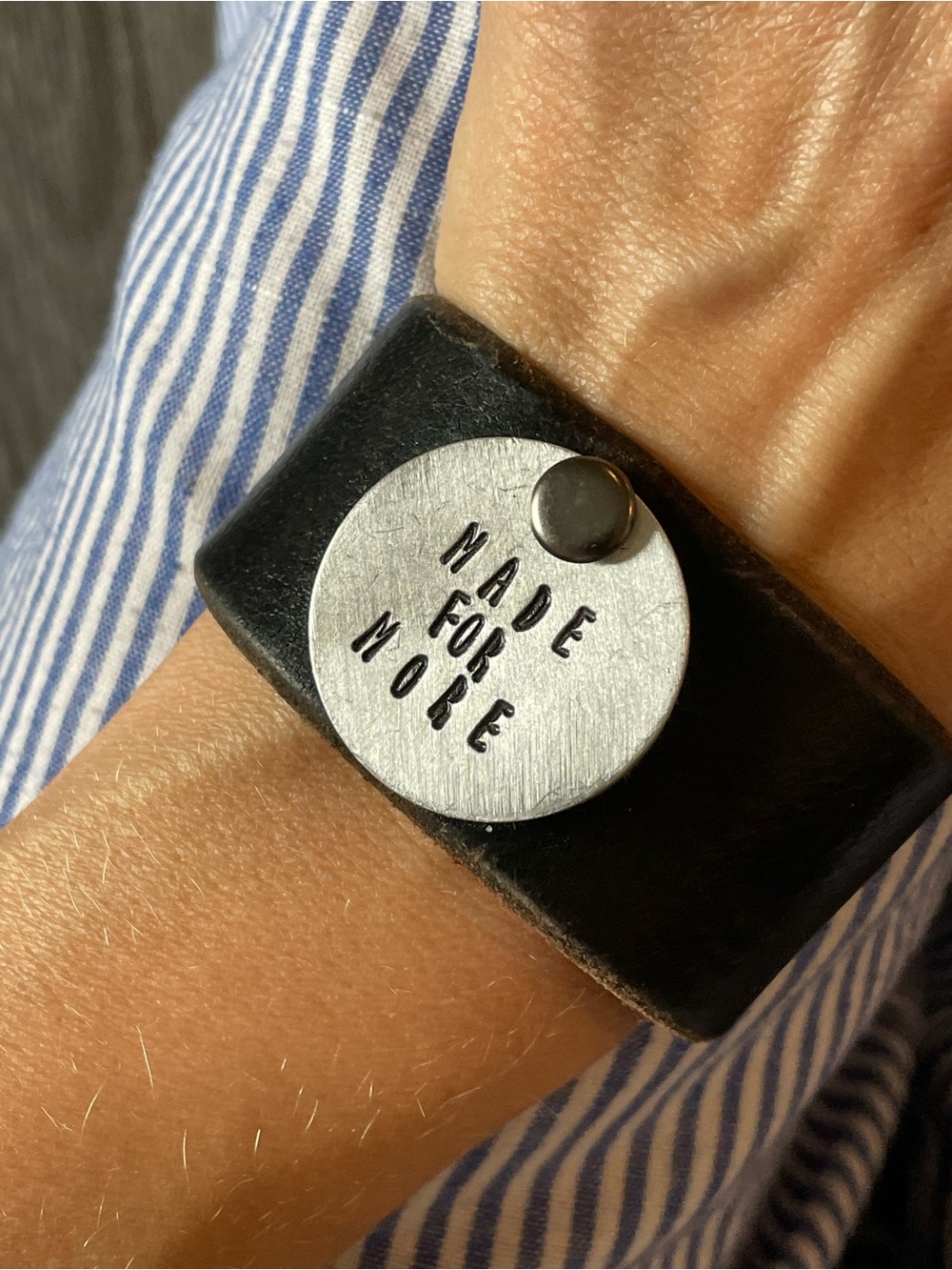 Black Leather Cuff Bracelet with 'Made For More' Metal Disc